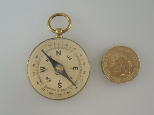 Gilt Metal Compass Fob. Circa 1950