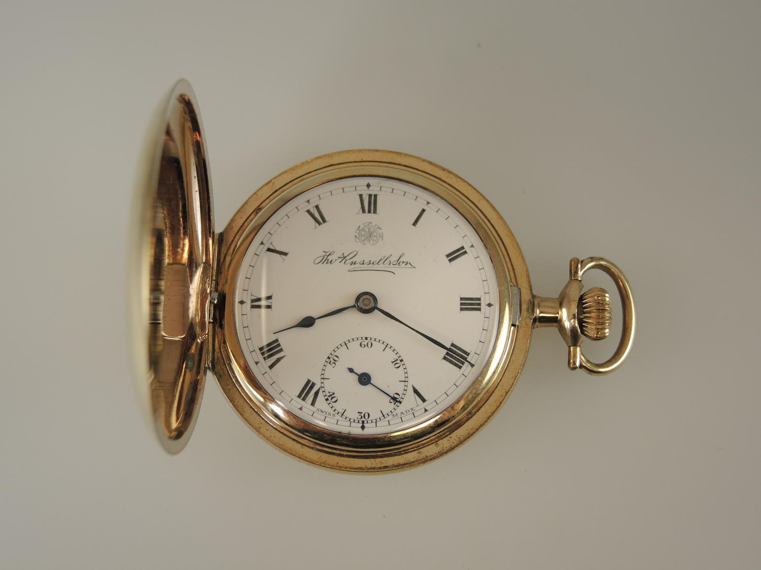 Gold plated antique hunter pocket watch by T Russell c1910