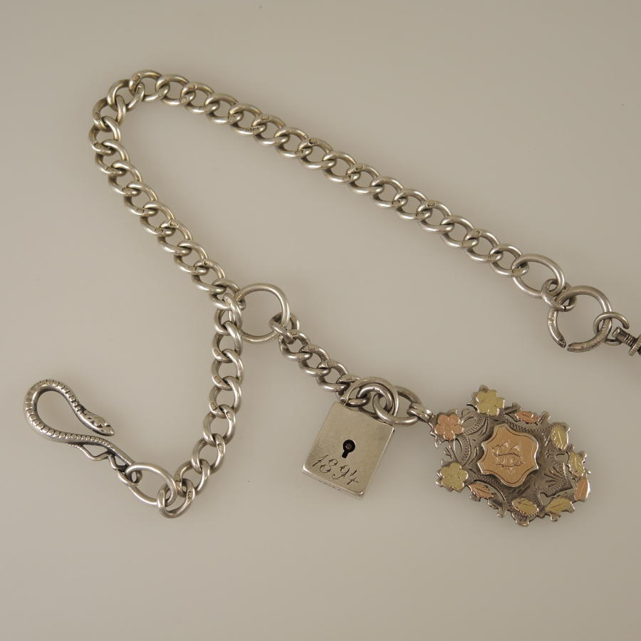 English silver watch chain with unusual fobs and Snake hook c1900