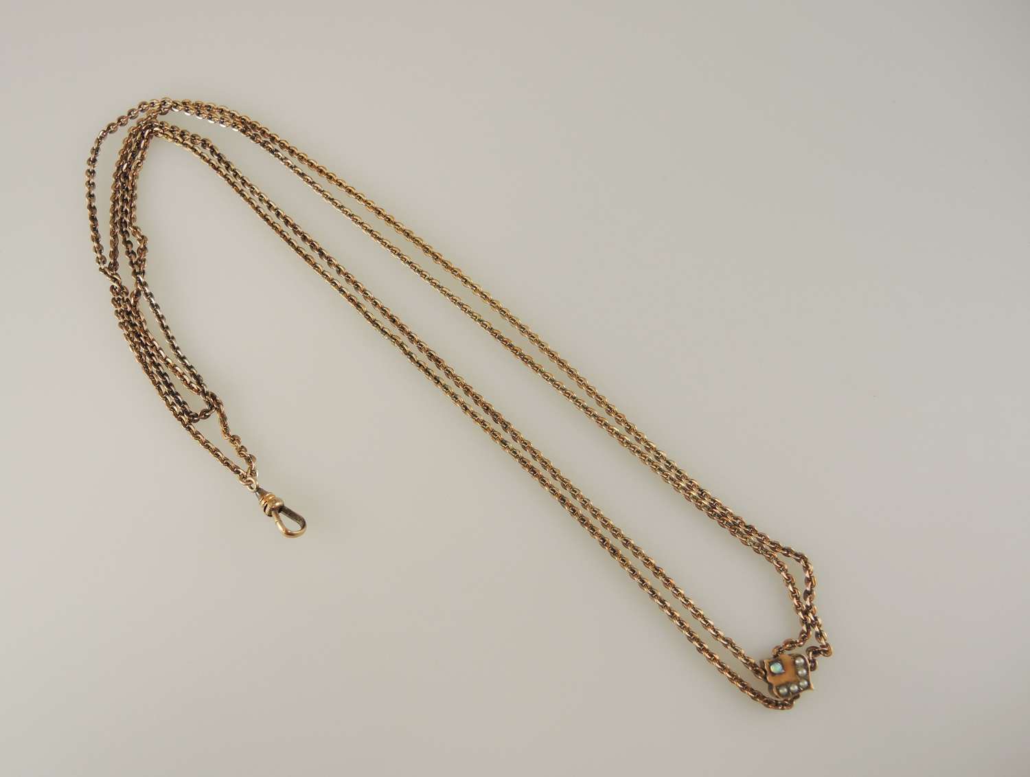 Victorian gold plated long guard chain with stone set slide c1890