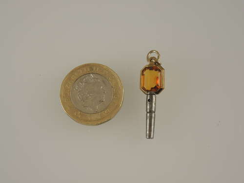 Gold cased and orange glass set pocket watch key c1850