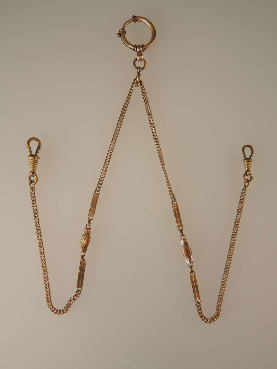 Long gold plated watch chain with bolt ring c1920