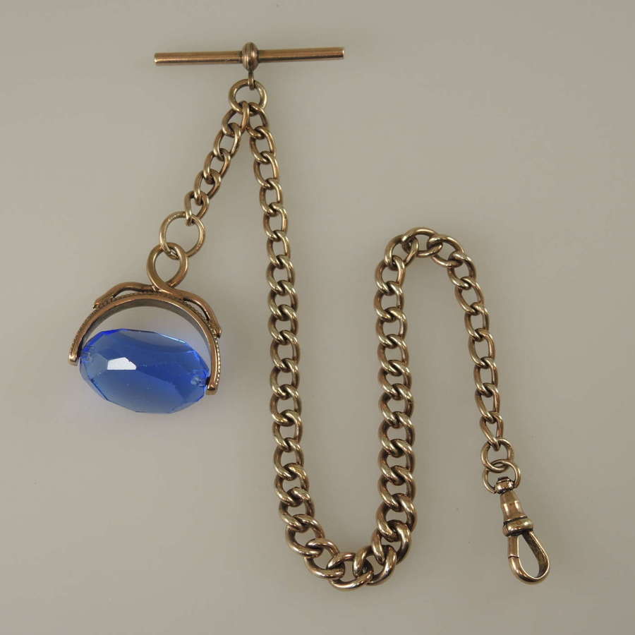 Gold plated pocket watch chain with a Blue glass spinner fob c1890