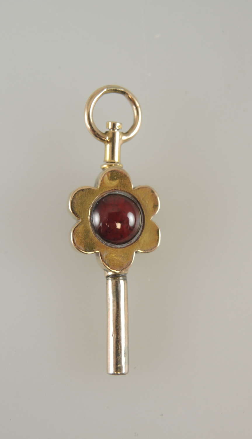 Gold Flower shaped pocket watch key c1850