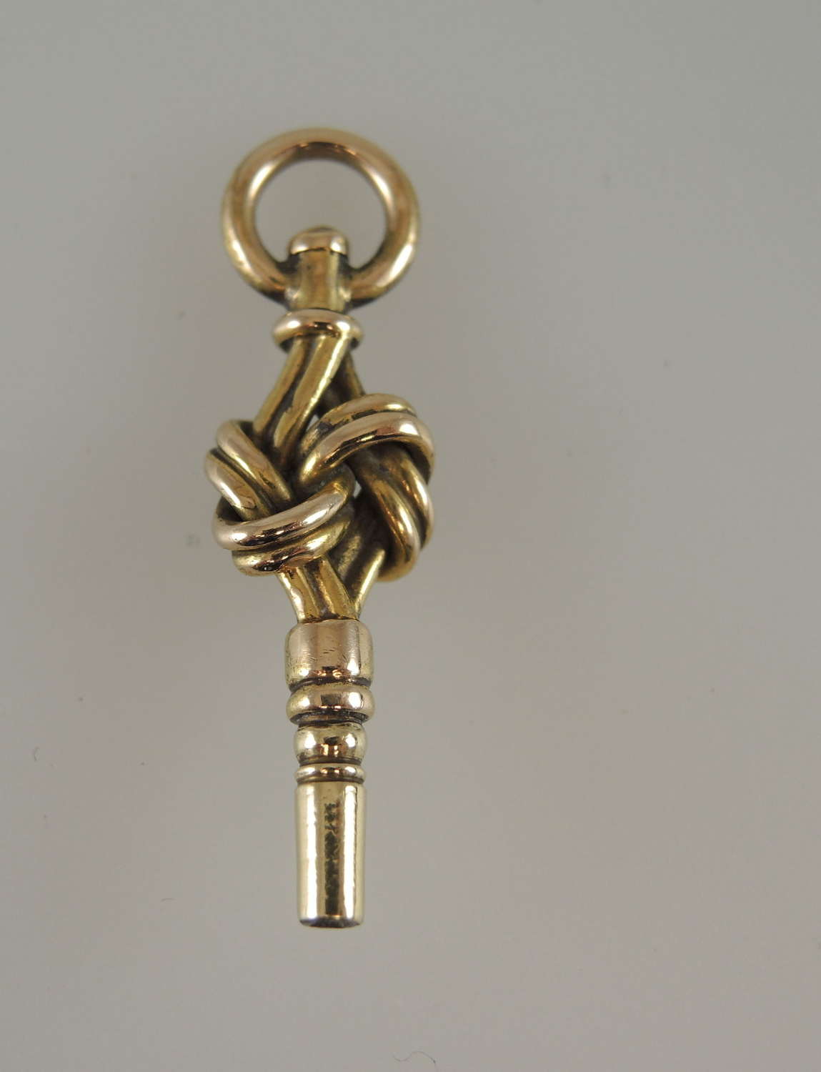 Victorian gilt KNOT shaped pocket watch key c1850