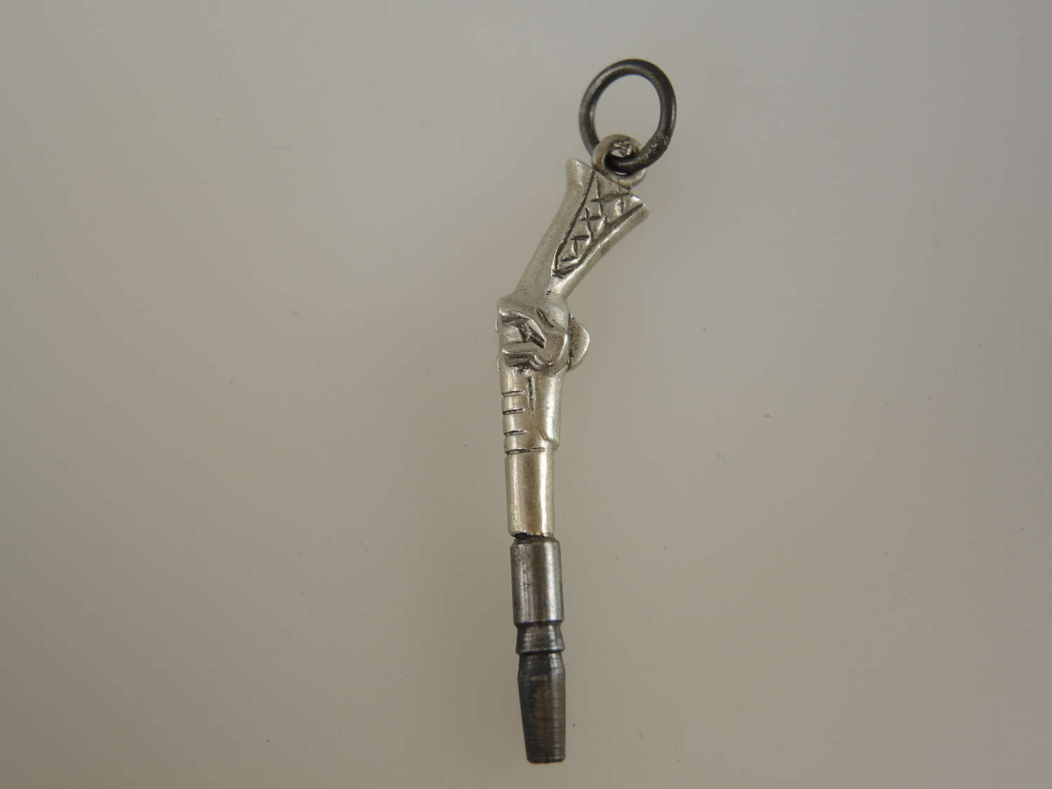 Silver revolver pocket watch key c1890