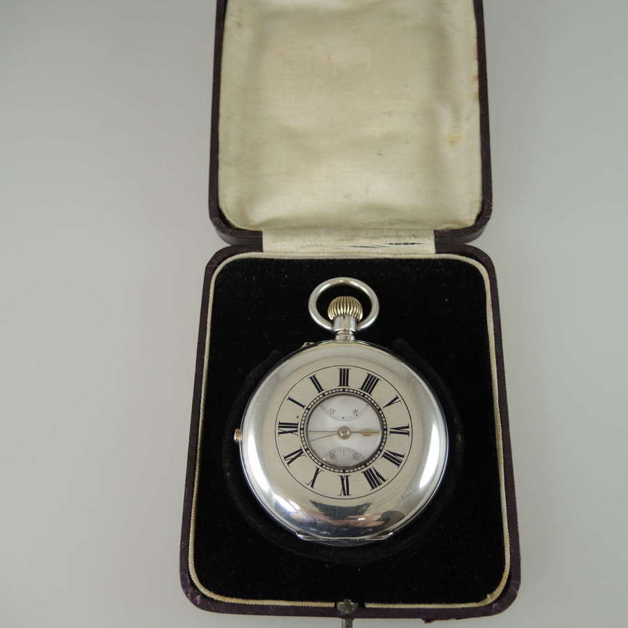 Large silver half hunter pocket watch with chronograph by Smiths c1890