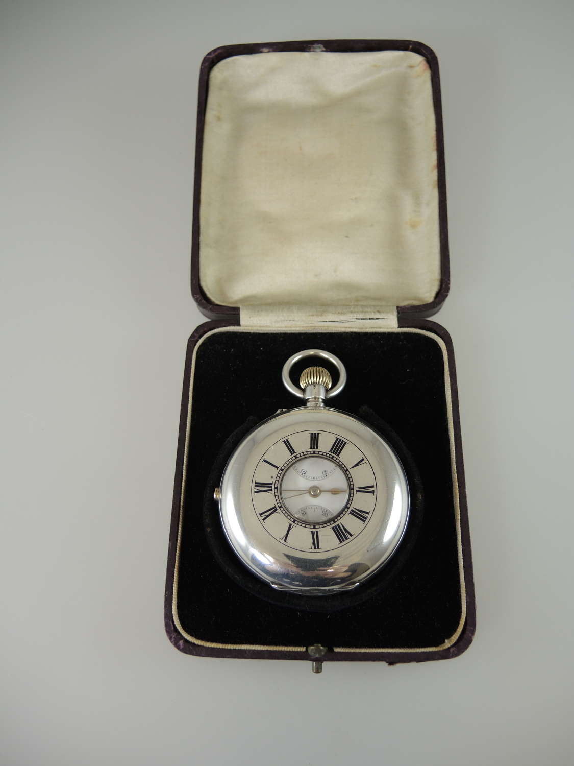 Large silver half hunter pocket watch with chronograph by Smiths c1890