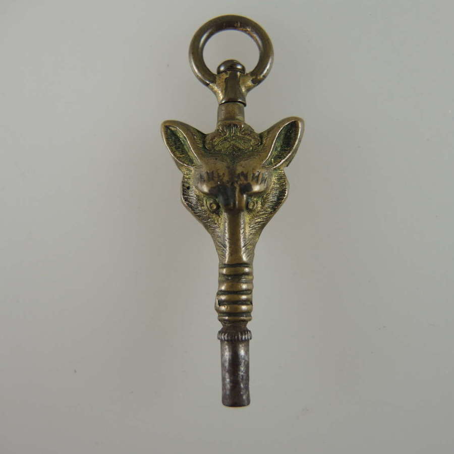 Gilt metal FOX shaped pocket watch key c1850
