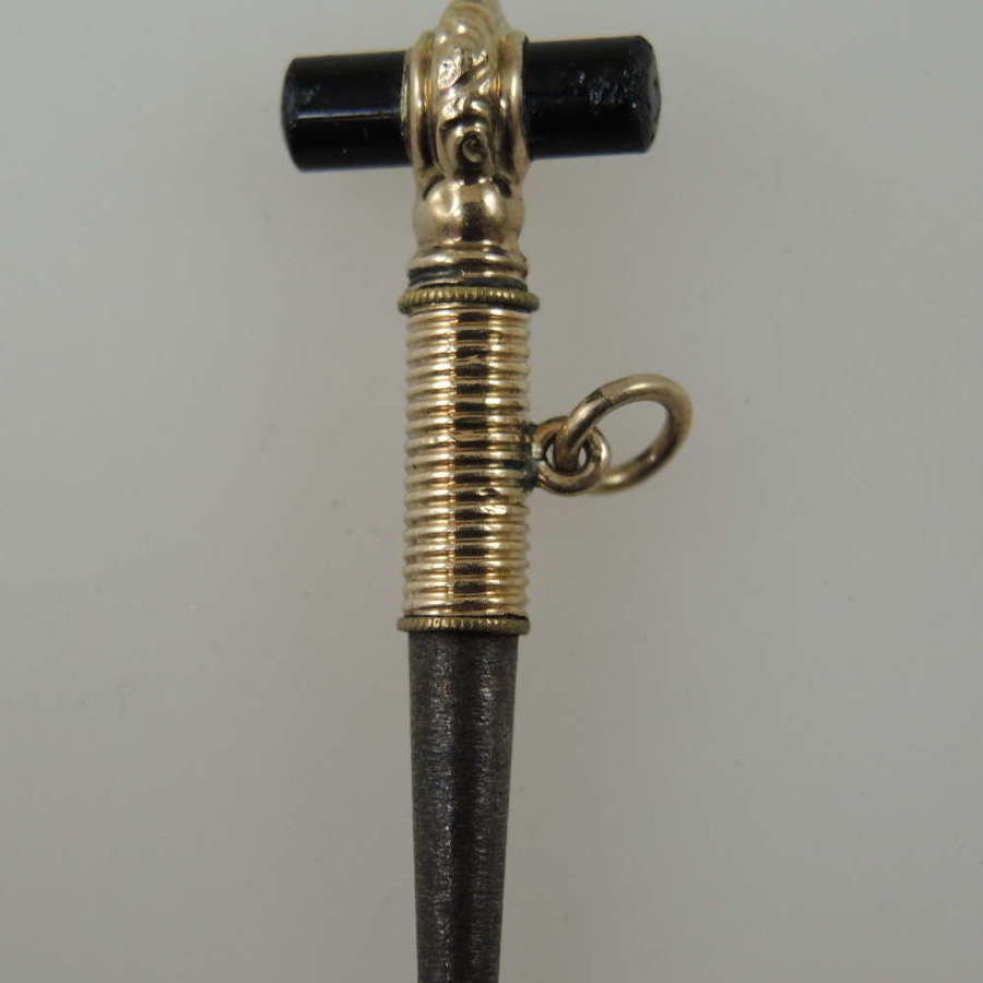 Gilt and black stone set pocket watch key c1850