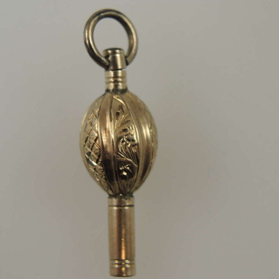 Beautiful gold cased oval ball shaped pocket watch key c1850