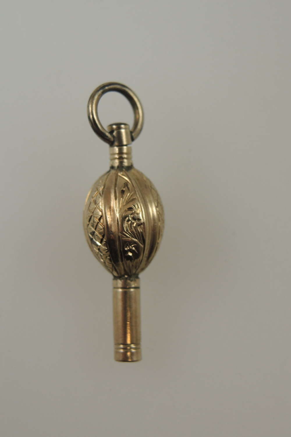 Beautiful gold cased oval ball shaped pocket watch key c1850