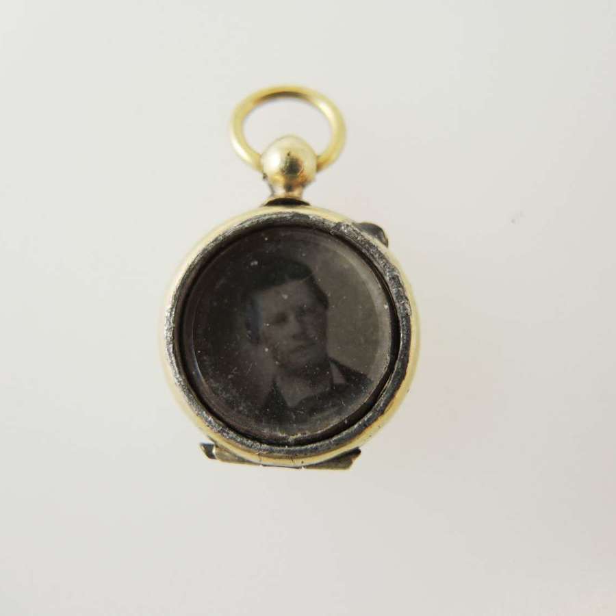 Miniature gilt Victorian locket in the form of a pocket watch c1880