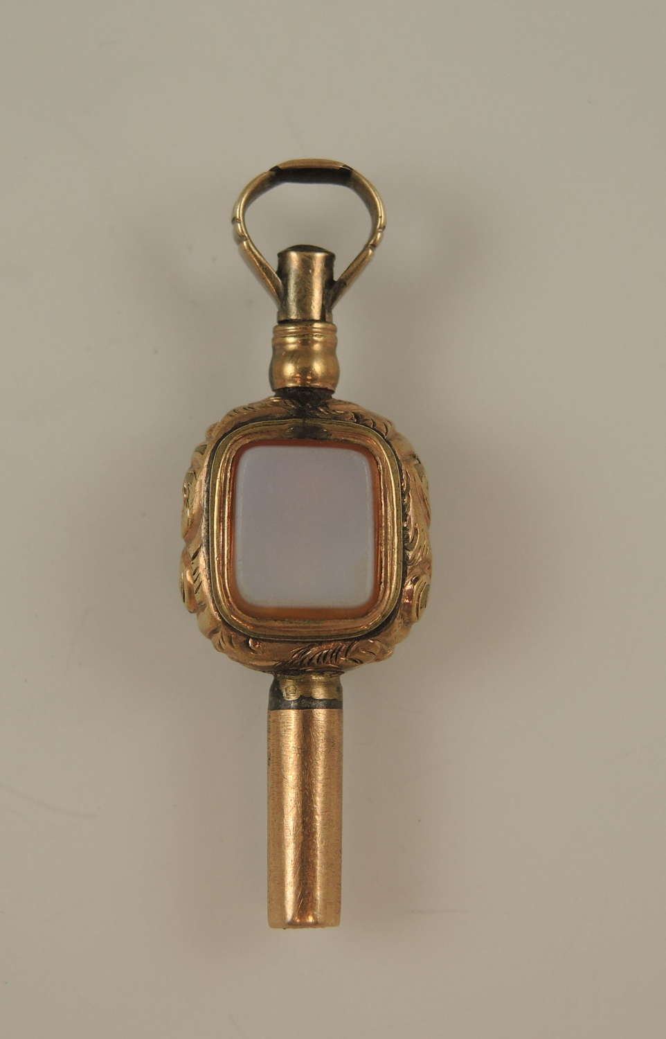 Victorian gilt stone set pocket watch key. Charm size c1850