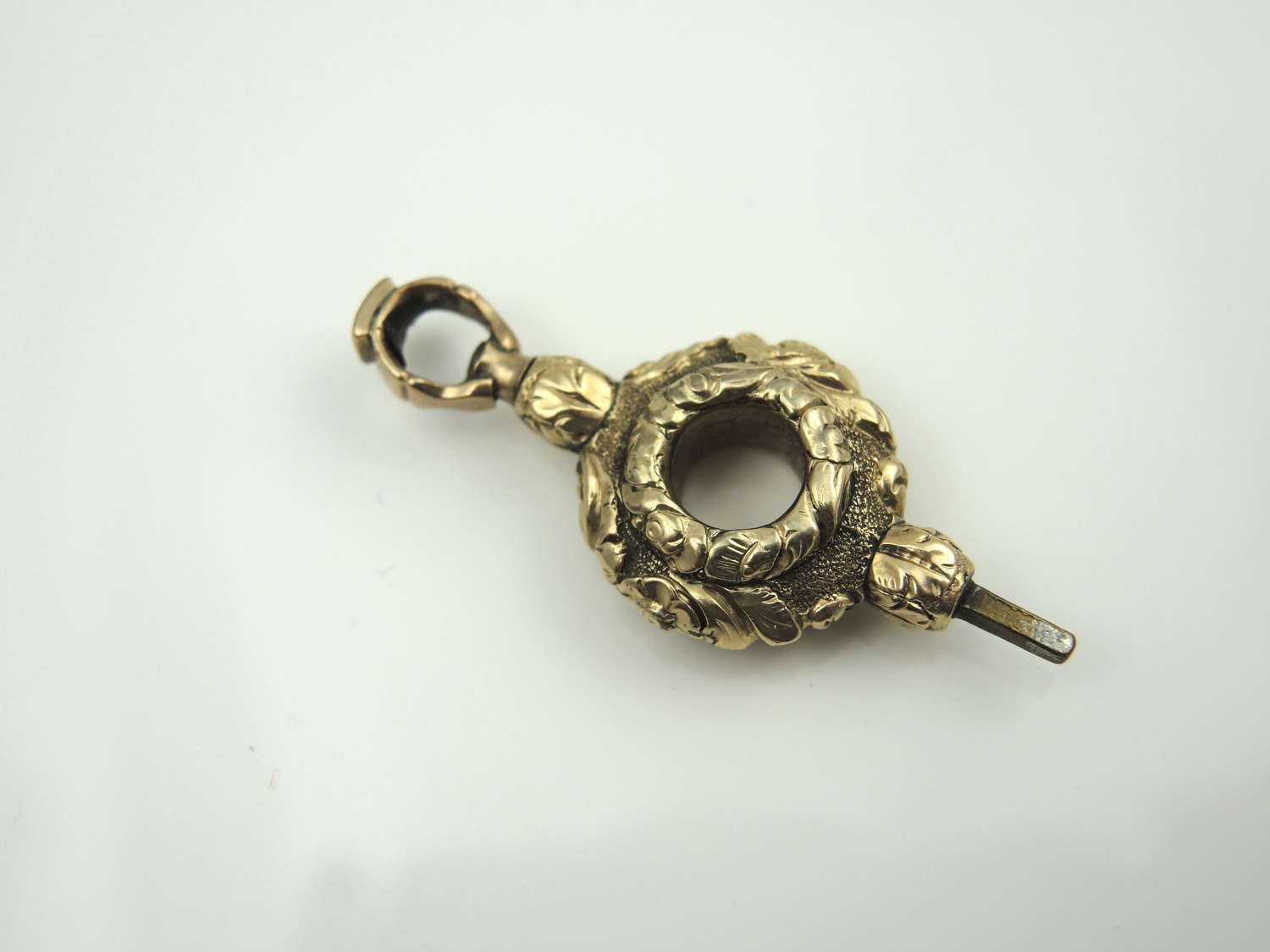 Unusual gold cased pocket watch key with female winding c1850