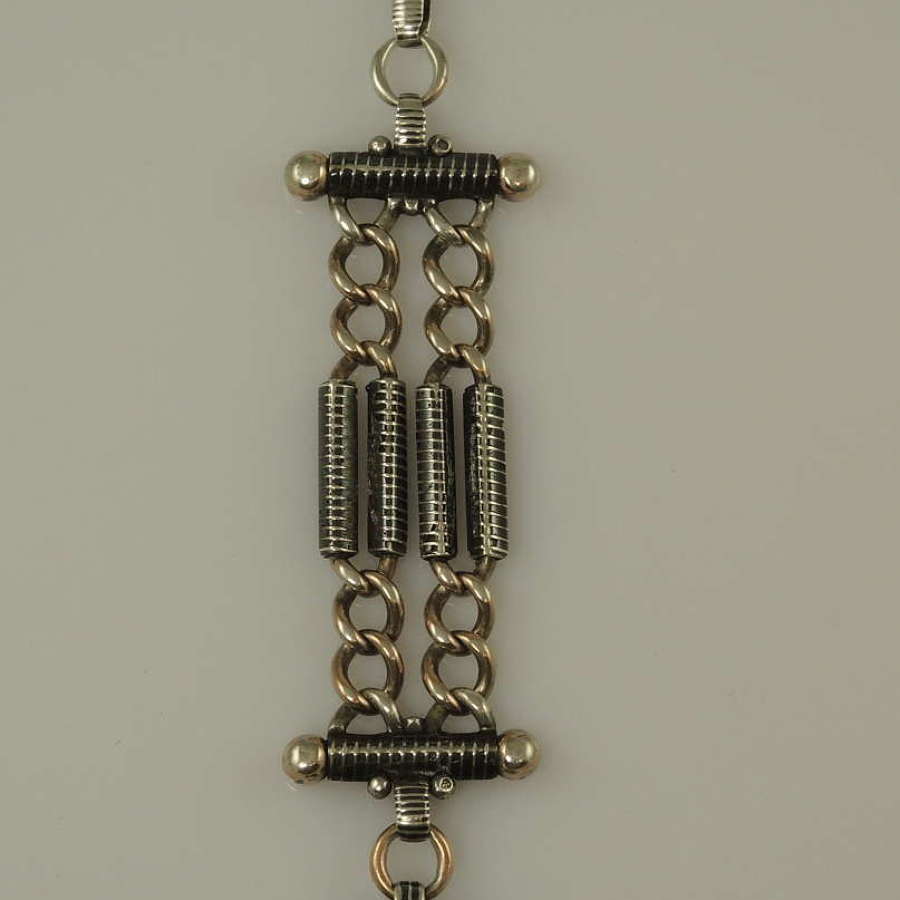Silver and niello chatelaine with matching locket c1890