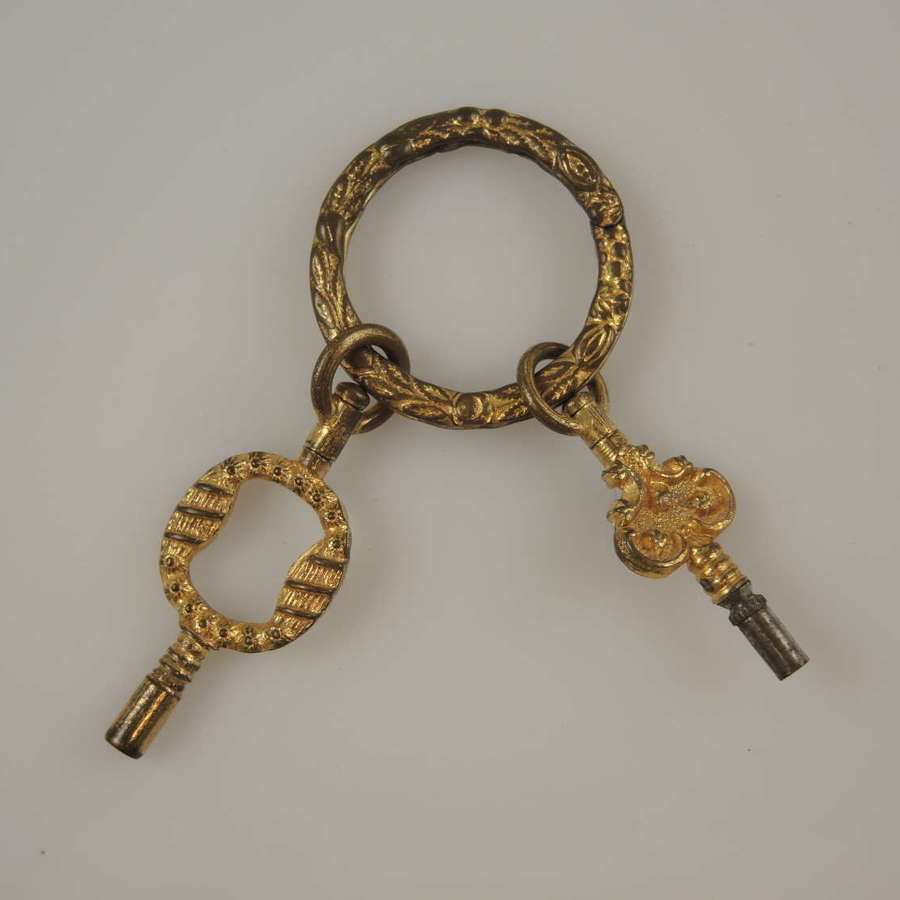 Superb gilt Georgian pocket watch key with carved split ring c1810