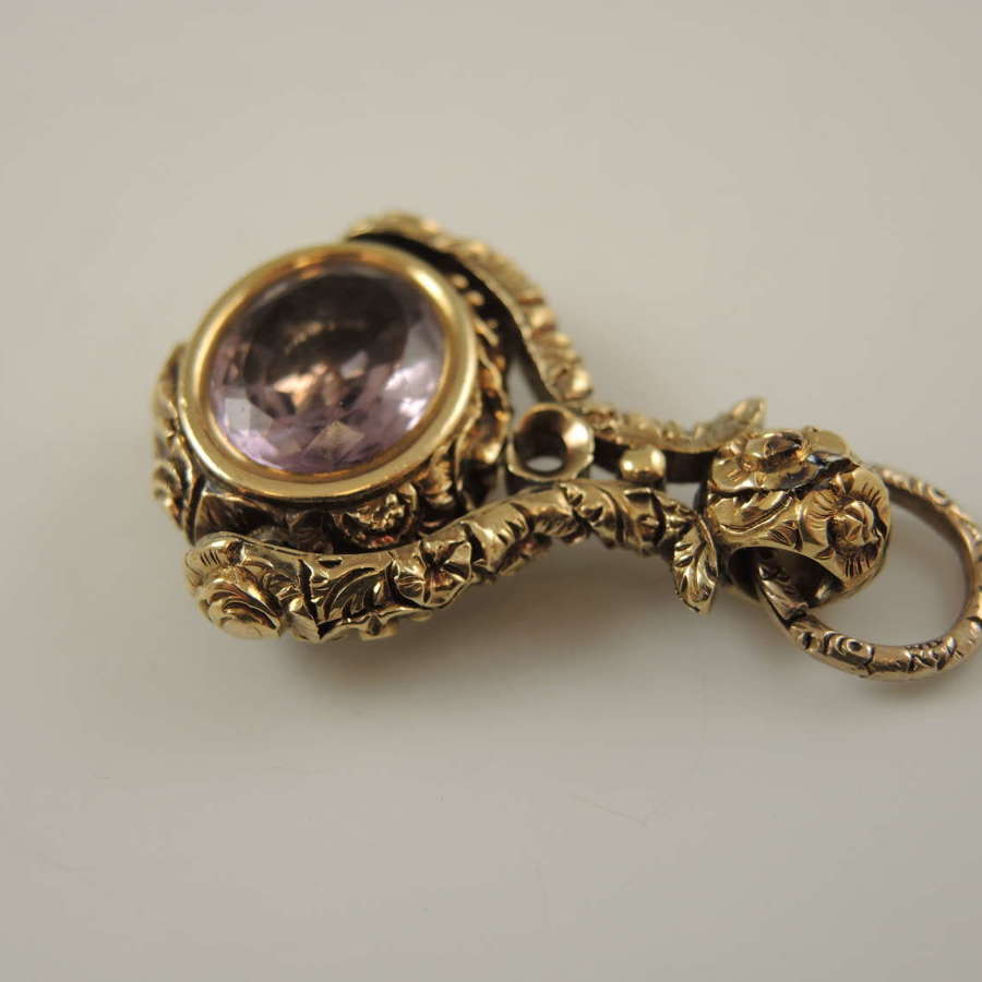 Solid gold and amethyst spinner fob c1850