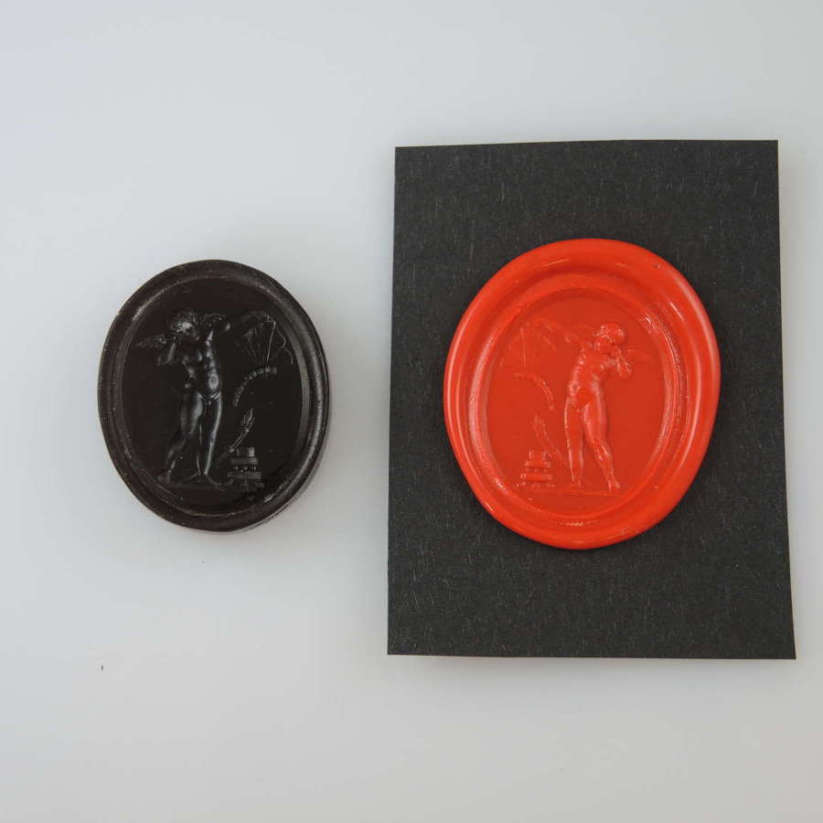Classical antiquity intaglio of Cupid and butterfly wings c1810