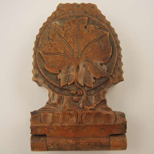 Black Forest watch stand with a carved oak leaf c1890