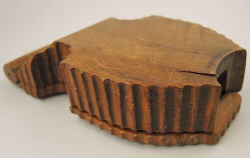 Black Forest watch stand with a carved oak leaf c1890