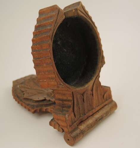Black Forest watch stand with a carved oak leaf c1890