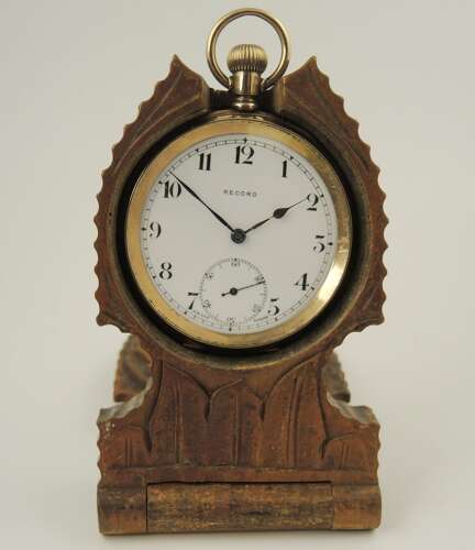 Black Forest watch stand with a carved oak leaf c1890