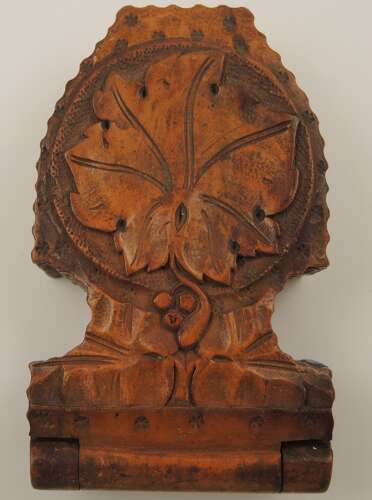 Black Forest watch stand with a carved oak leaf c1890