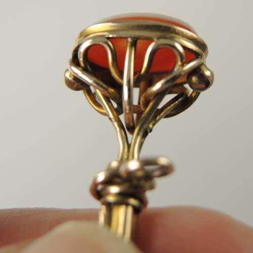 Victorian gilt cased pocket watch key set with an agate base c1850