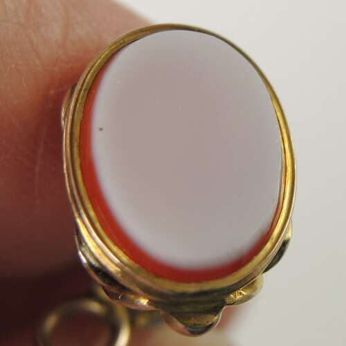 Victorian gilt cased pocket watch key set with an agate base c1850